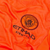 78106808 Puma x Kidsuper Manchester City GK Jersey Neon Sun-PUMA Black